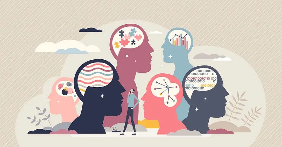 Flat illustration of six colored head silhouettes in profile around a small standing man with one hand at his chin, each head holding a different pattern, such as puzzle pieces, wavy stripes, a bar chart, a network of nodes, binary digits and colored dots.