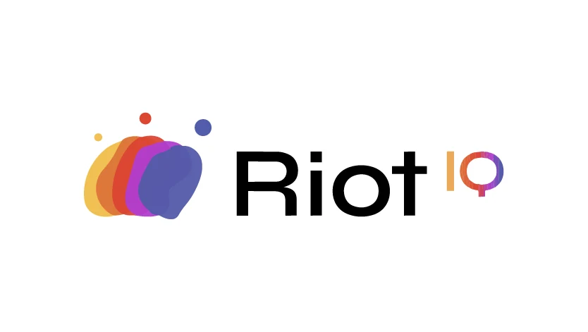 The Riot IQ logo on a white background, with five overlapping rounded shapes in yellow, orange, red, magenta and blue, three small dots above them, the word Riot in large black letters and a small IQ in orange, red and purple at its upper right.