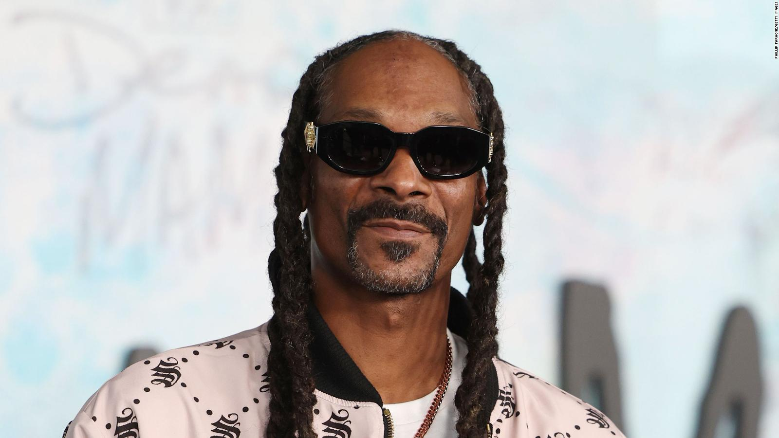 Snoop Dogg portrait beside an IQ 147 claim marked unverified