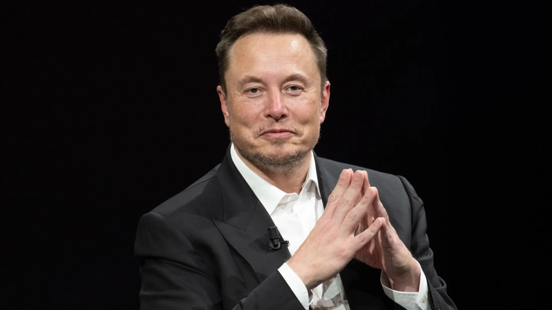 Elon Musk portrait used on the ACIS profile page about the Elon Musk IQ claim.